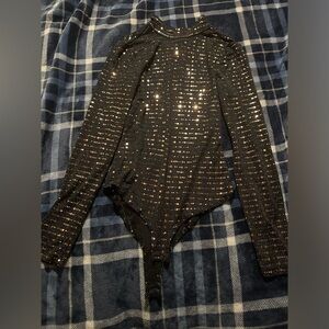 Shiny body suit